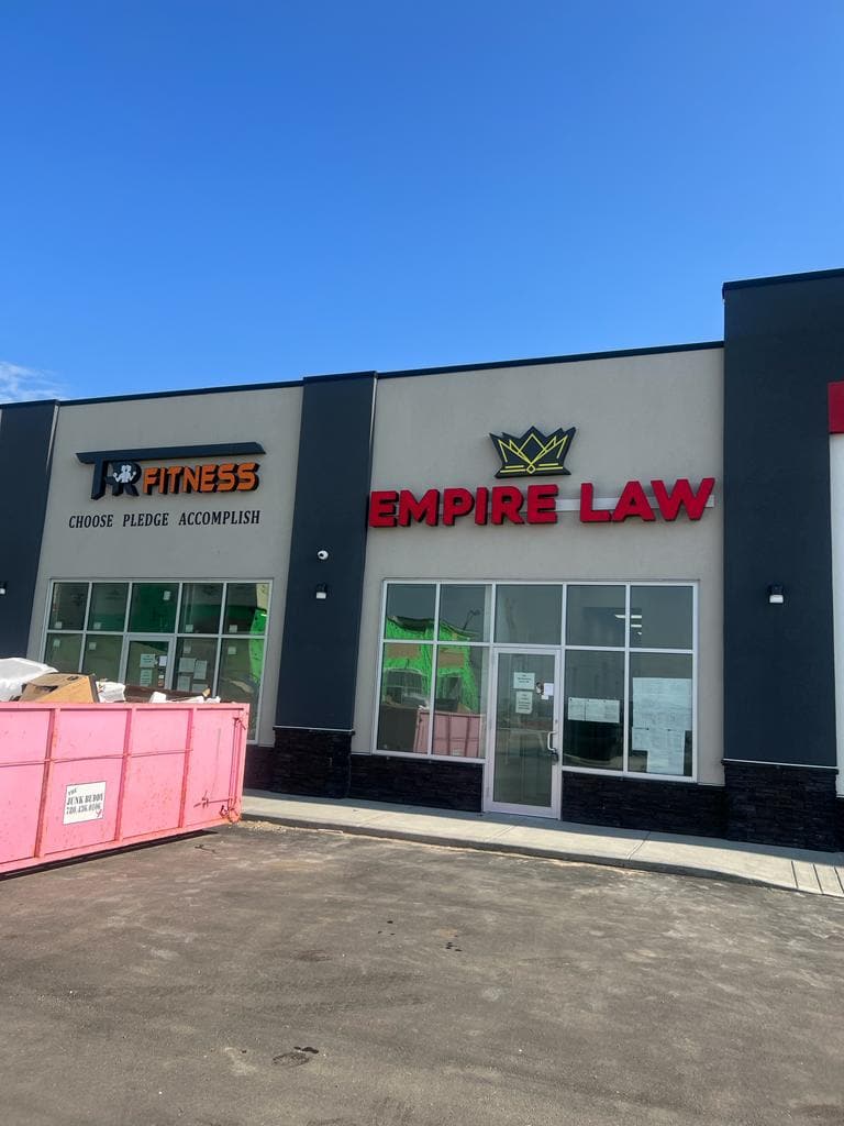 Empire Law red channel letters with crown logo