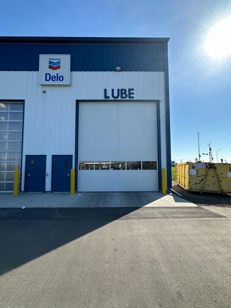 Lube bay sign on a service building